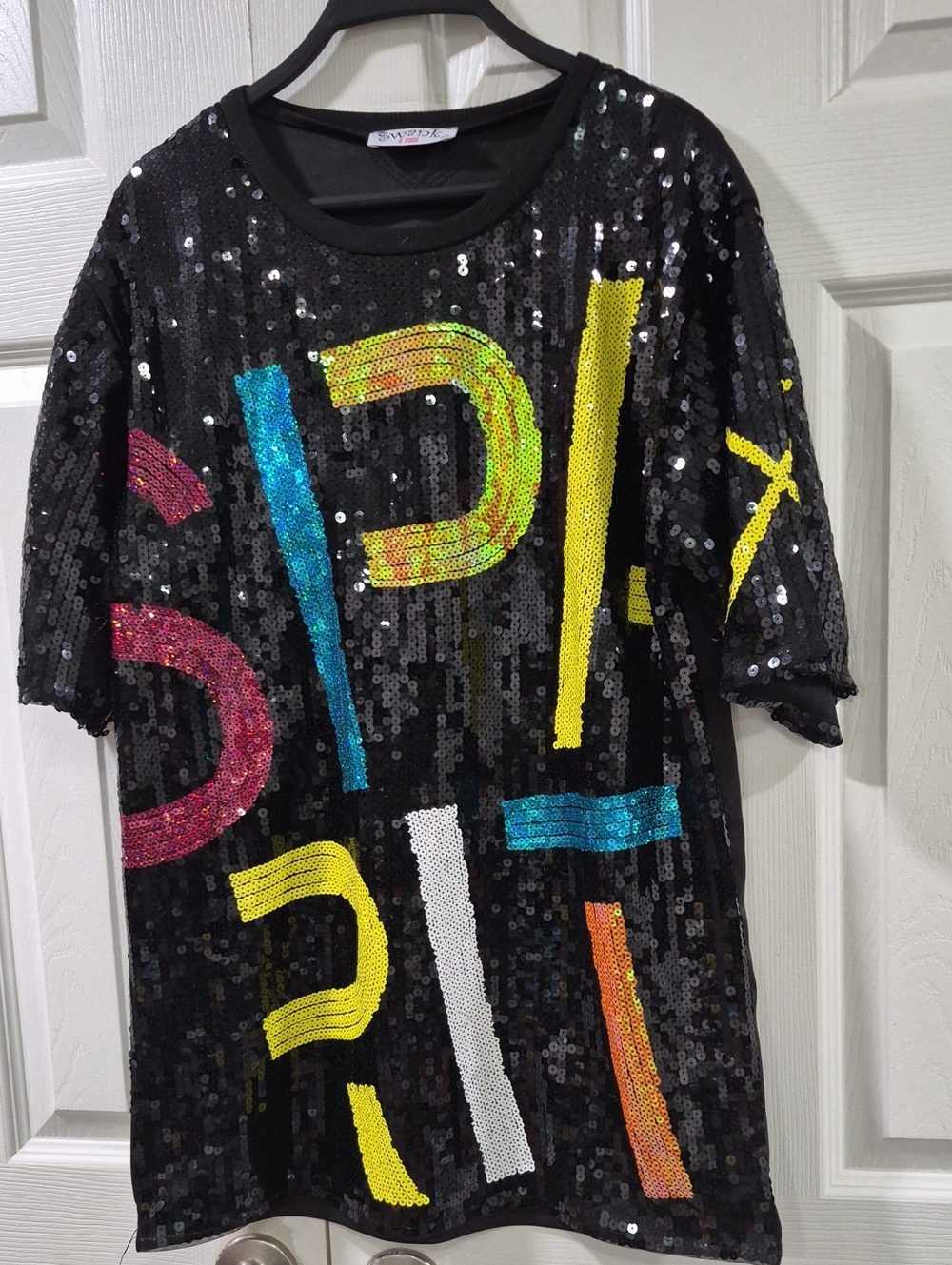 SWANK Black Sequin Short Sleeve Tee with Multicolor Sequin Graphic Accents.